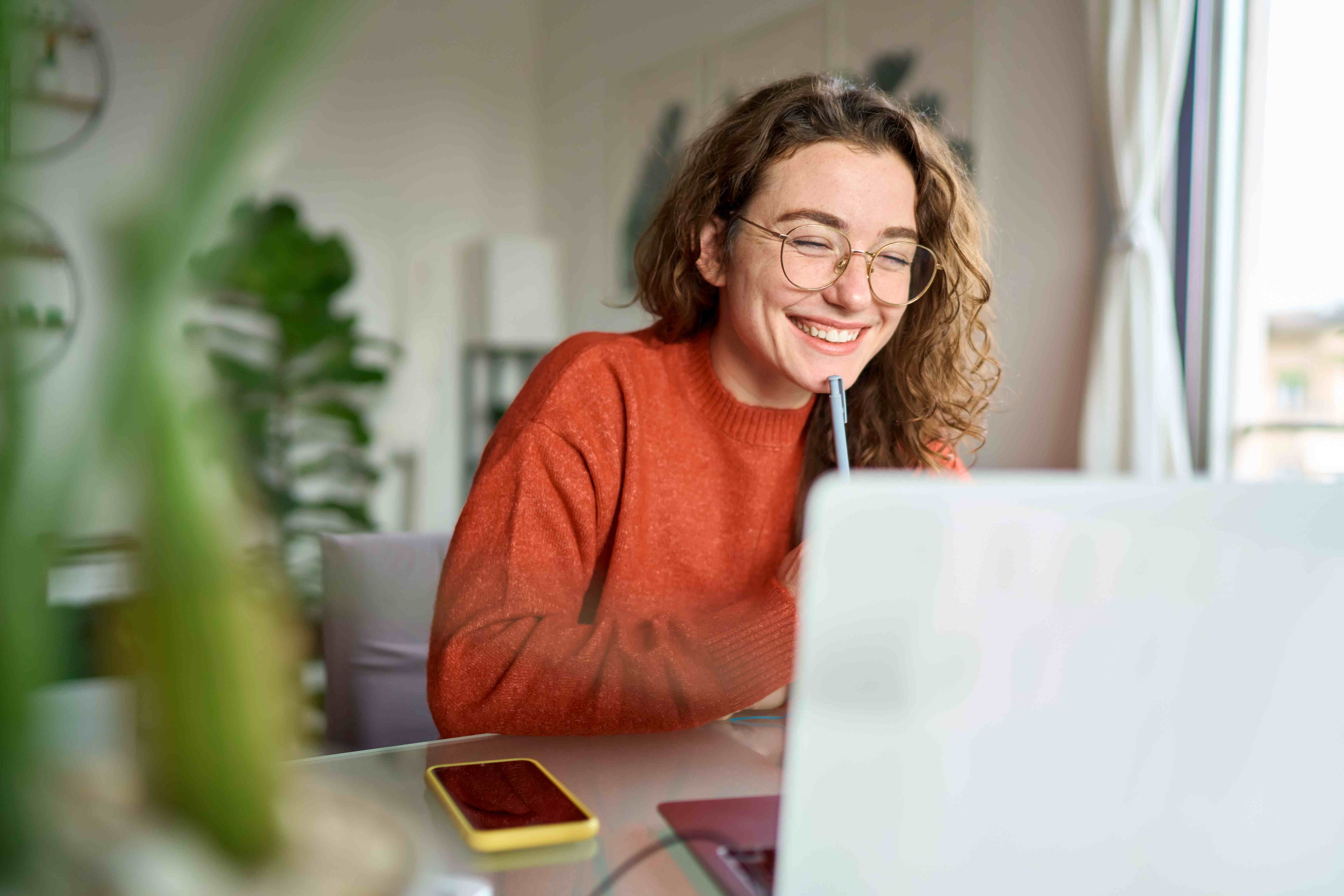 Woman comparing security quotes on a laptop
